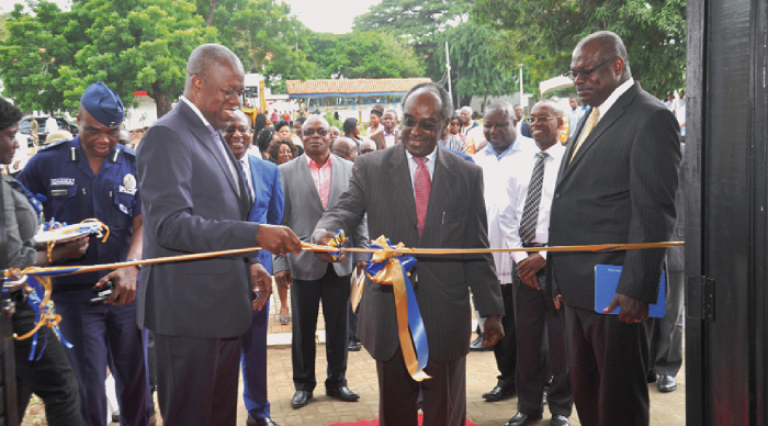 Vice President Amissah-Arthur assisting Prof. Date-Baah (middle), Chairman, University Governing Board, to cut the tape to inaugurate the building. With them is Prof. Ernest Aryeetey (right), the Vice-Chancellor of the University of Ghana.